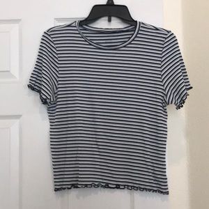 Top it’s gently used . Like new color os blue, light blue & white stripe